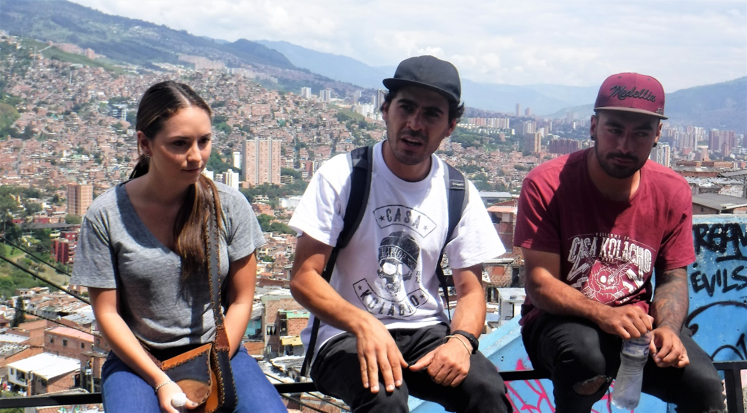 A group of people on a mountain Description automatically generated