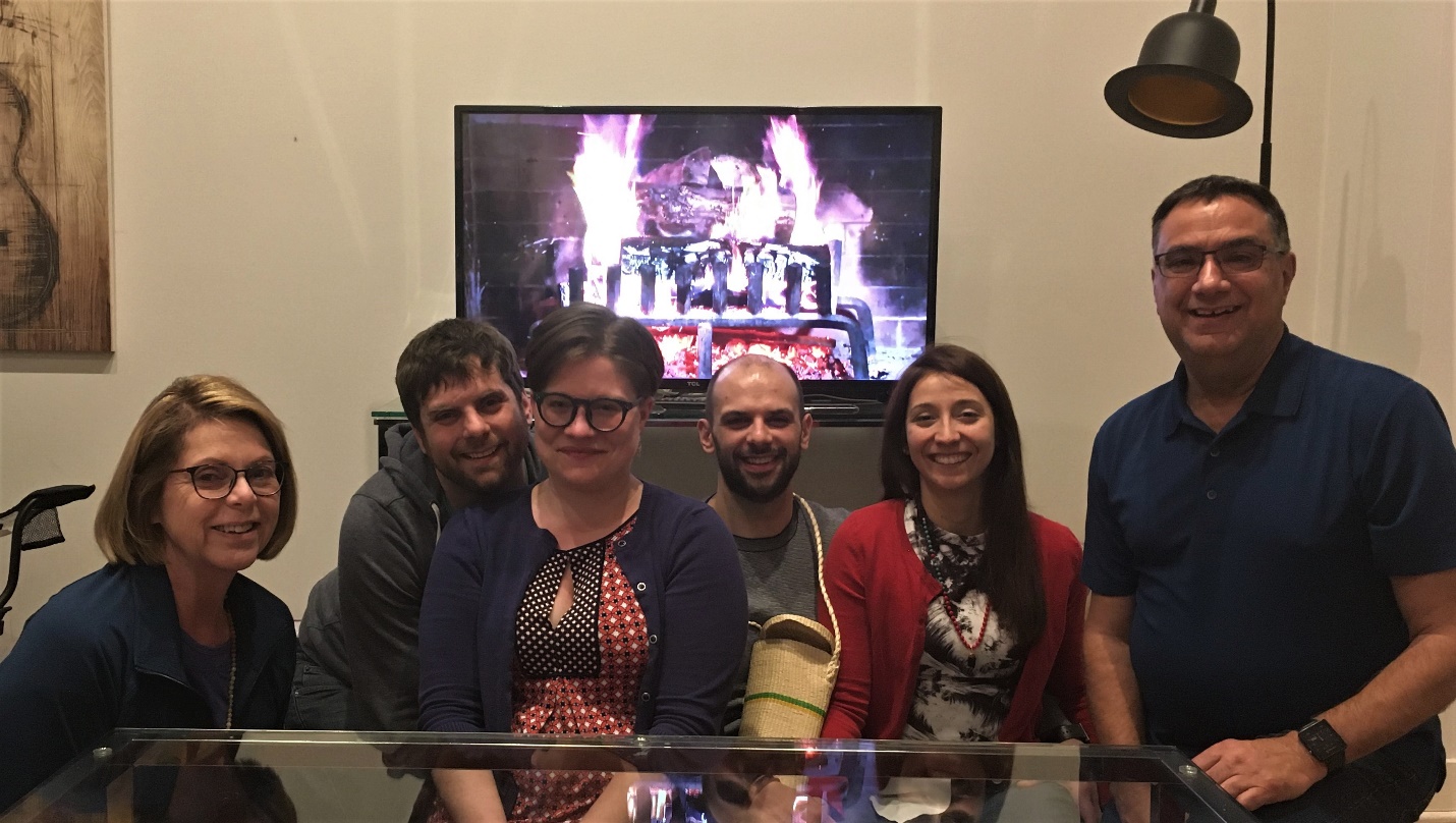 A group of people posing for a photo Description automatically generated