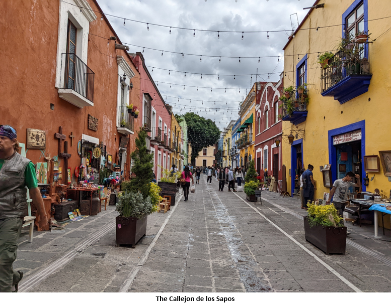 A picture containing building, outdoor, way, scene Description automatically generated