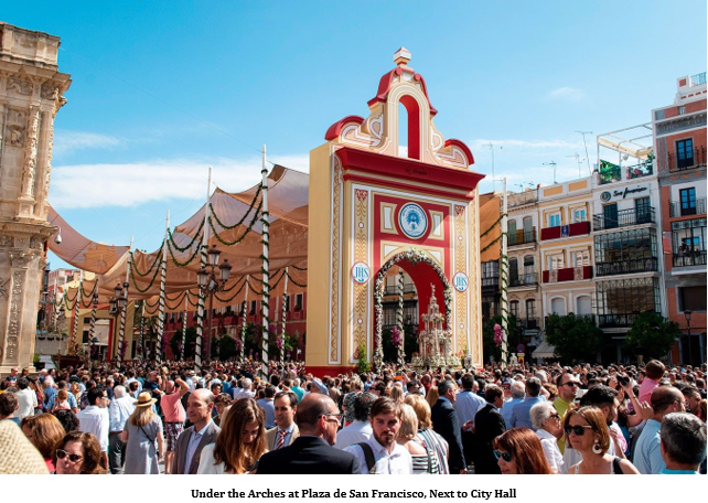 A crowd of people in a street Description automatically generated